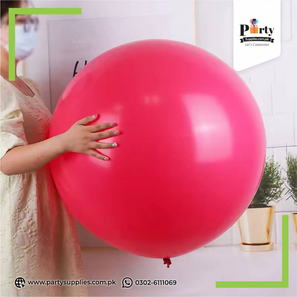 Shocking pink large latex balloon