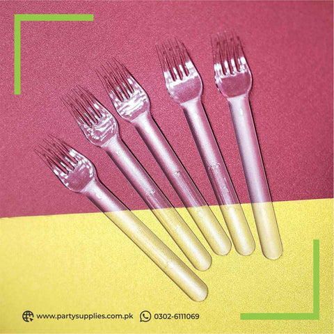 Transparent plastic forks for dinner table decoration