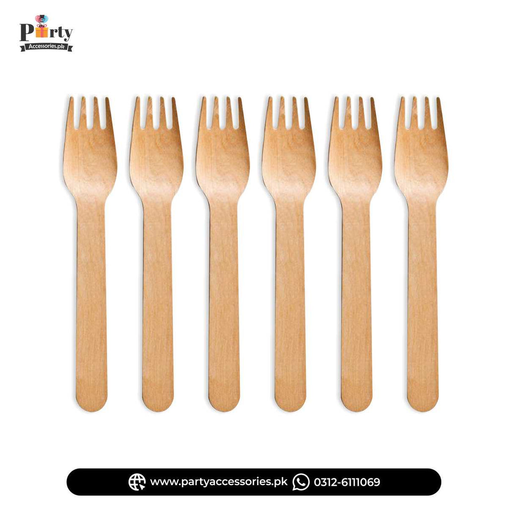 Wooden forks for dinner party table decoration