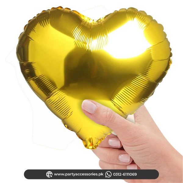 heart shape small foil balloons in golden